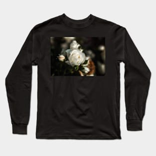 White Flower on a Dark Bokeh Background Long Sleeve T-Shirt